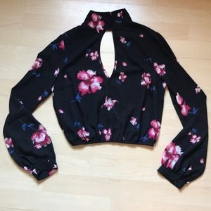 BCNU black floral top with key hole front & back